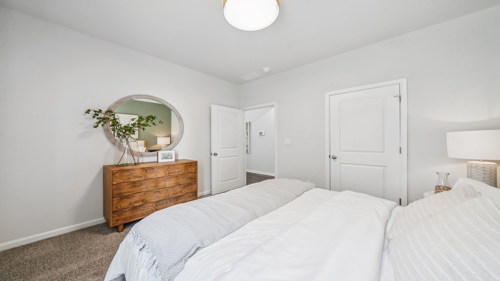 Secondary bedroom in Green Spring Estates includes natural window light, closet with sizeable space, connectivity