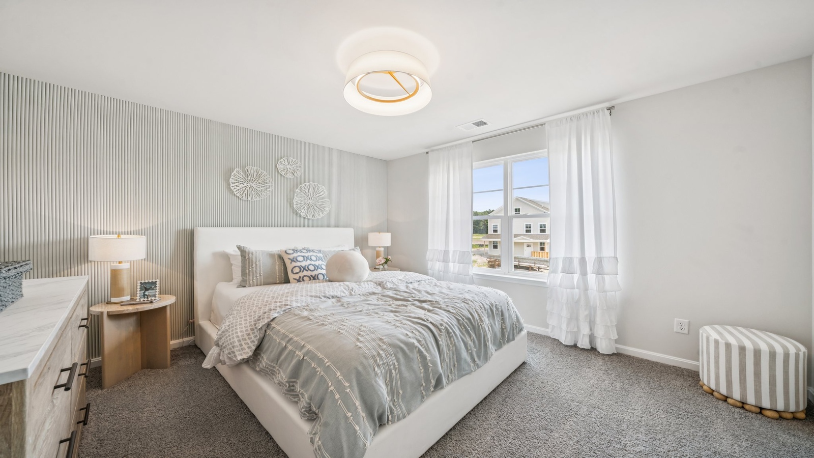 Secondary bedroom, flex-office, study, entertainment, and game room in this D.R. Horton new construction home