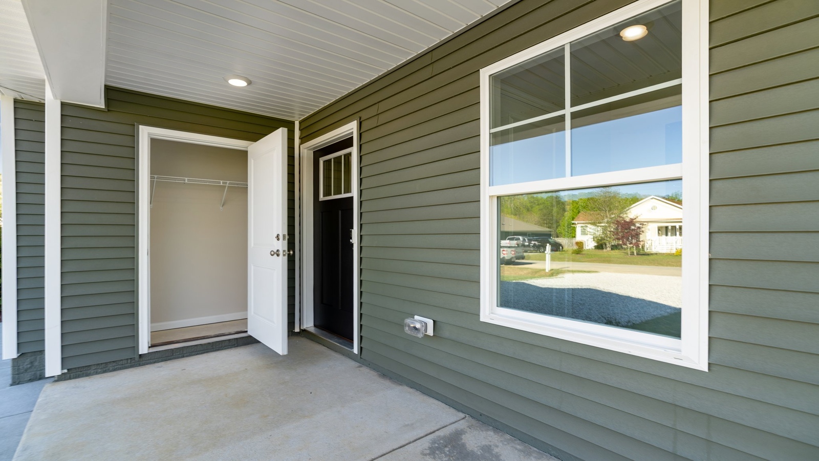 Springwood of Kilmarnock home front porch and main door entry, accessing the main entryway, living areas