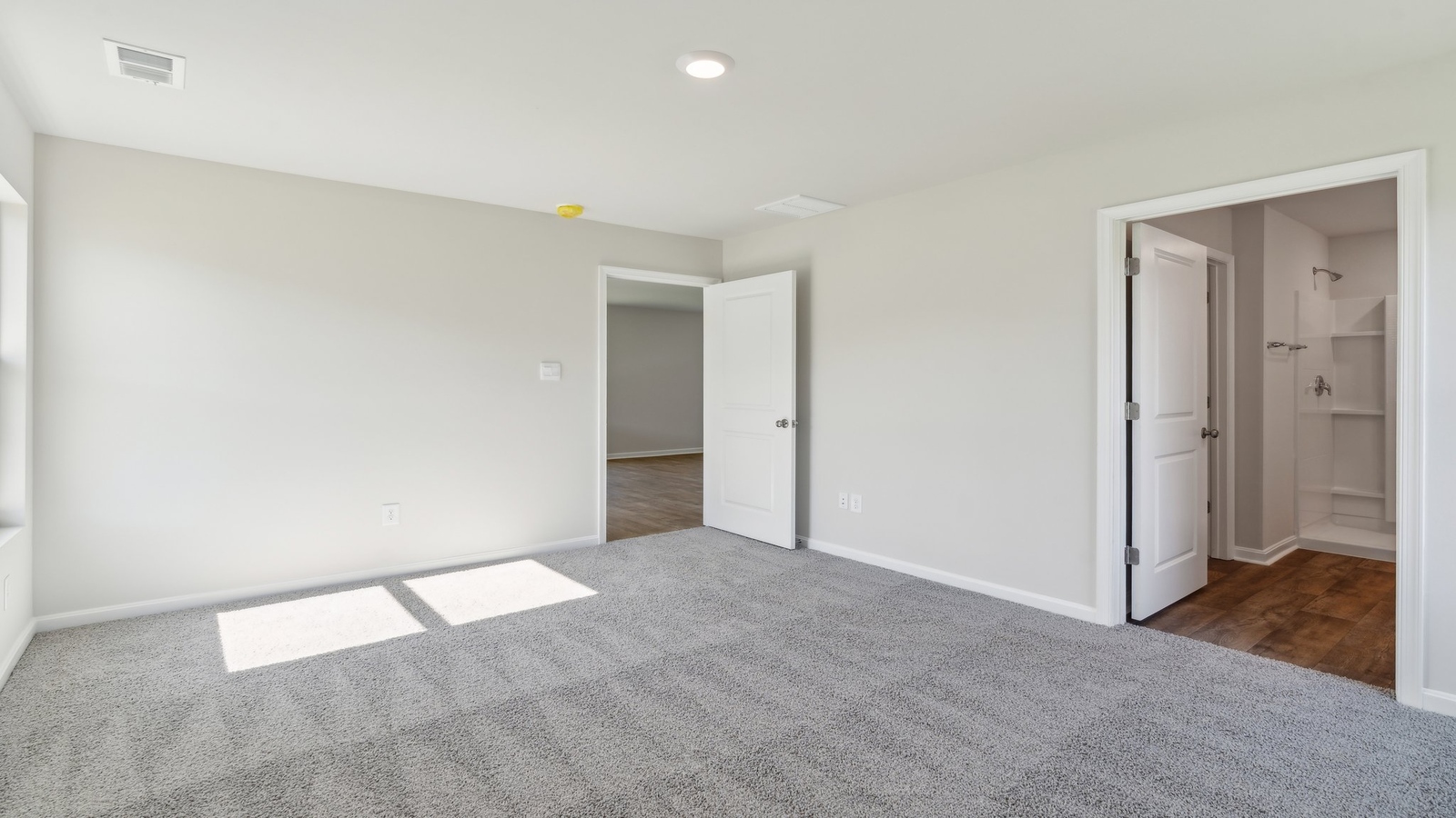 Bright and open owner's bedroom in Springwood of Kilmarnock overlooking the backyard, ensuite bathroom, walk-in closet