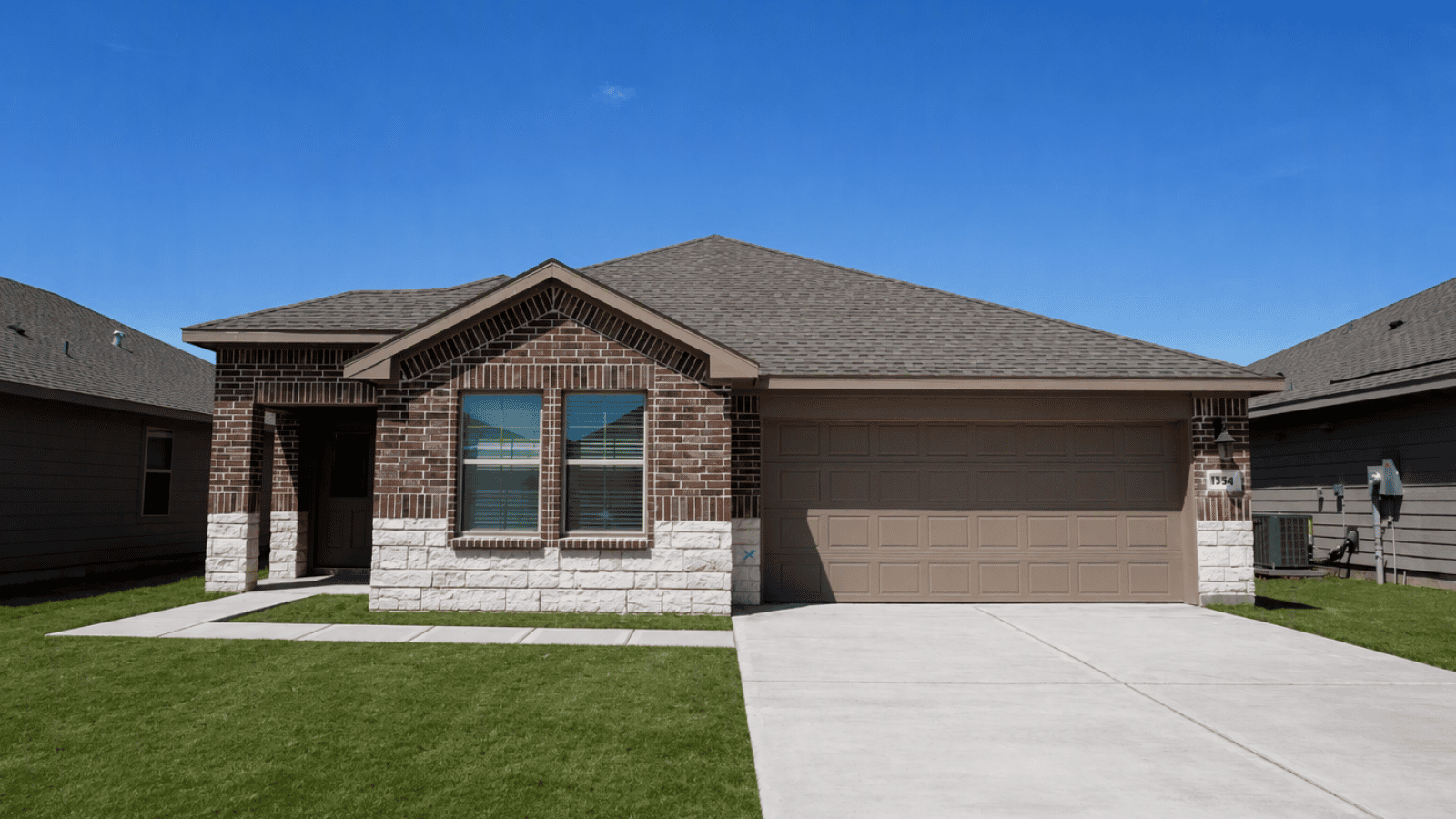 single family one story home with two car garage
