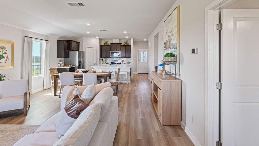 open concept kitchen and living and dining