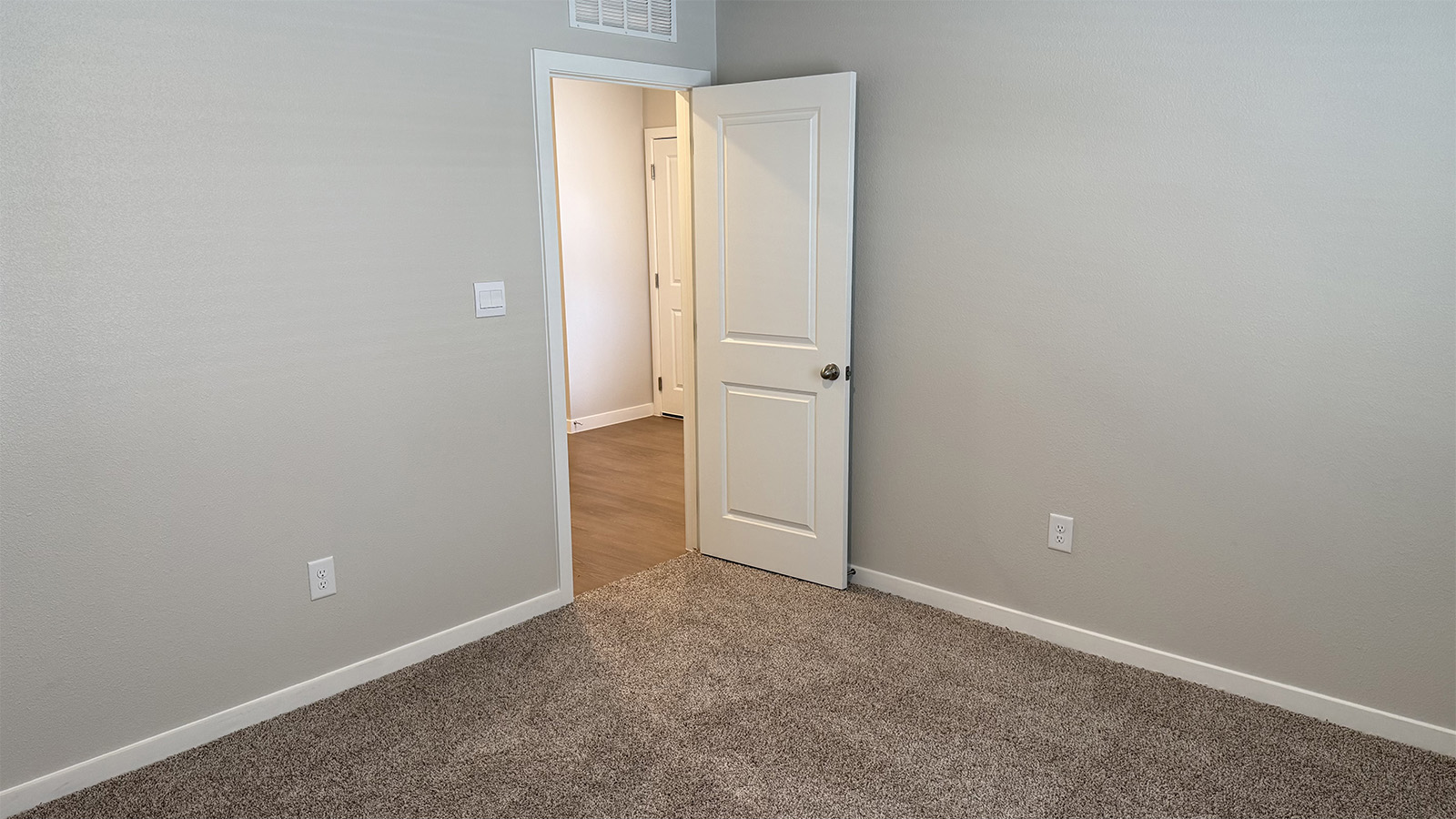 Second bedroom, flex-office, study, entertainment, game, craft room options in this D.R. Horton new construction home