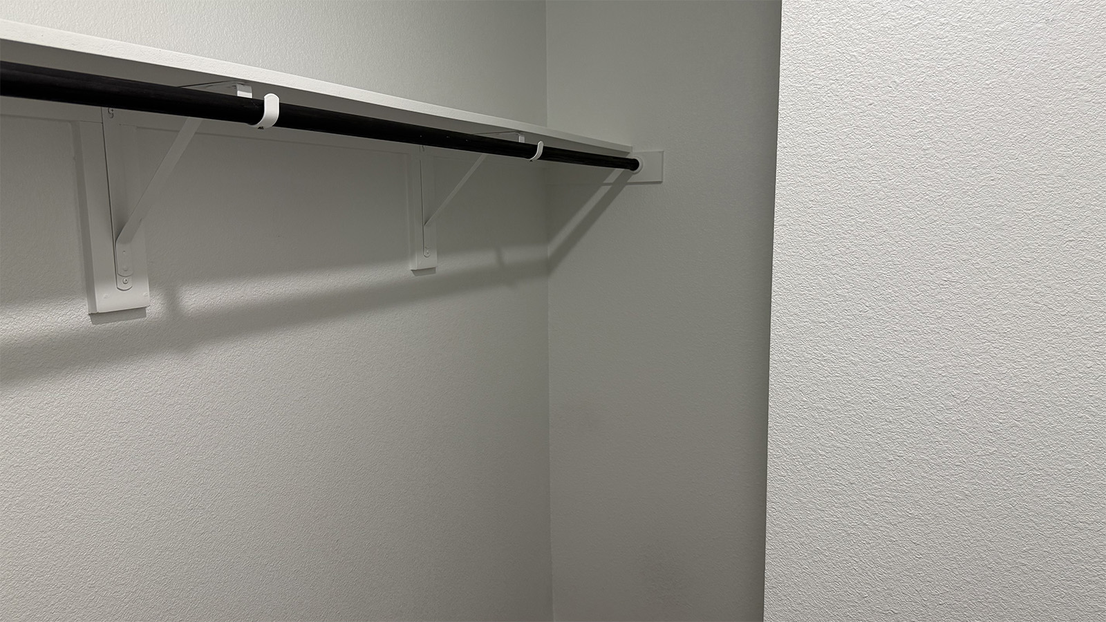 New home primary walk-in closet adds crafty organized space designed by D.R. Horton in Shiloh Springs