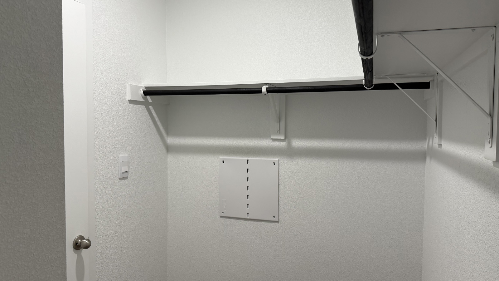 Interior view of walk-in closet in the primary bedroom, spa-inspired ensuite in Shiloh Springs, a new home by D.R. Horton