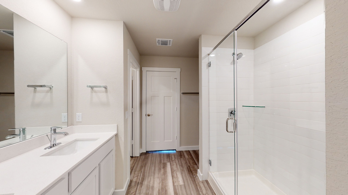 Bathroom 1 sinks and shower