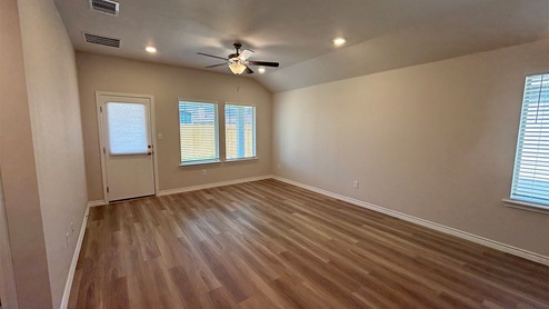 Living area with EVP flooring and celling fan