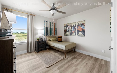 bed three with EVP flooring and celling fan