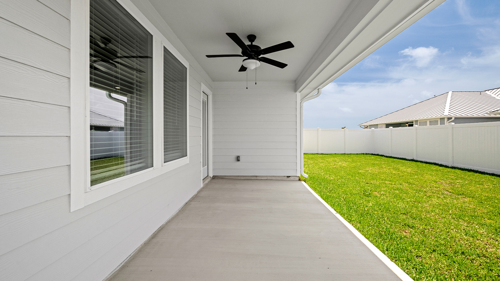 Covered patio with outdoor fan