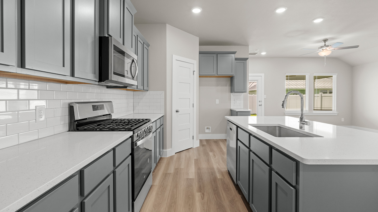 Kitchen with large corner pantry