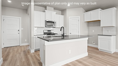 Island kitchen with breakfast bar