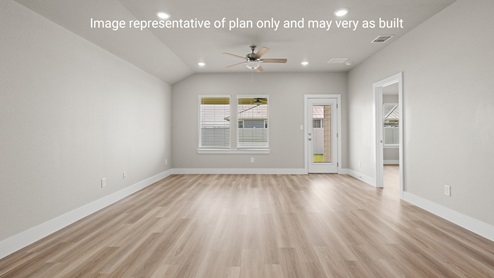 Open Living Room with large window and door to patio