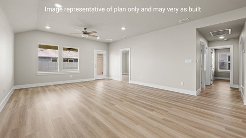 Living area with hall leading to bedroom