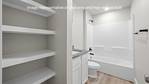Second Bath with tub shower combo and open shelving
