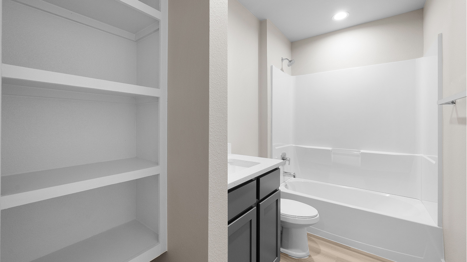 second bathroom with modern open built in shelving