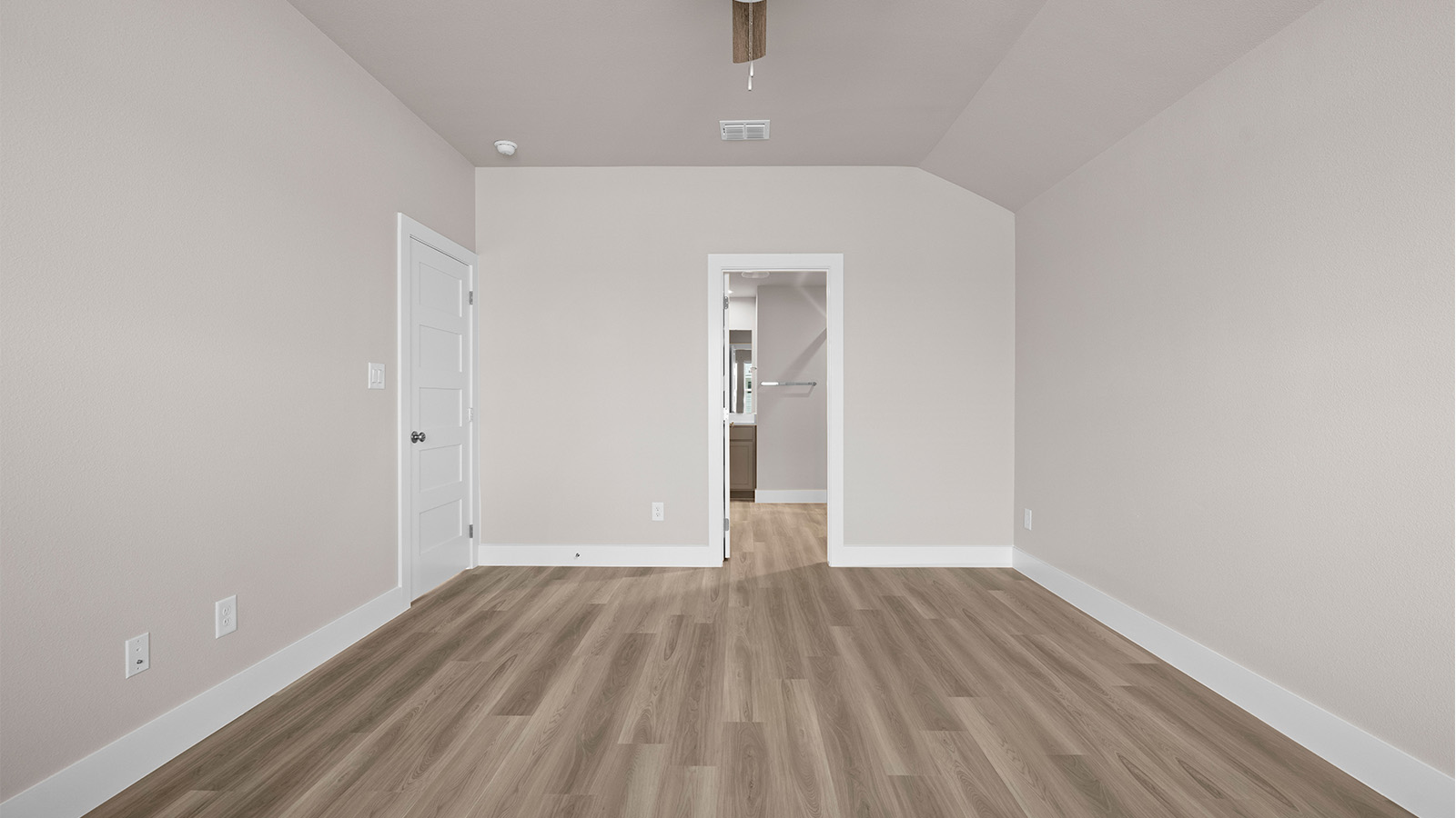 primary bedroom with attached bathroom