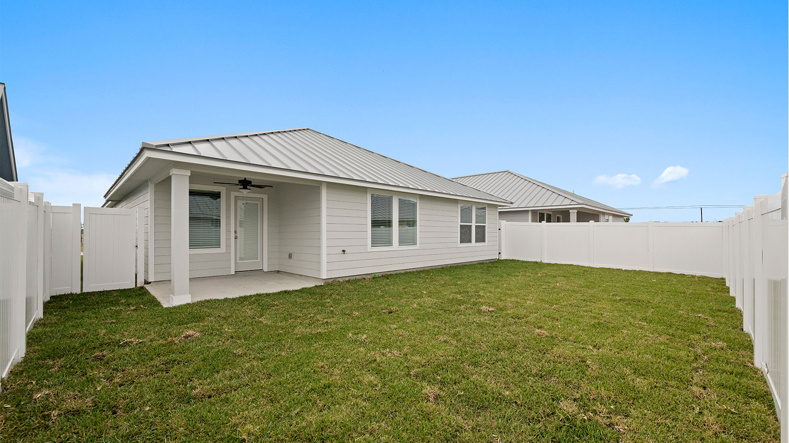 fully fenced backyard with upgraded landscape package