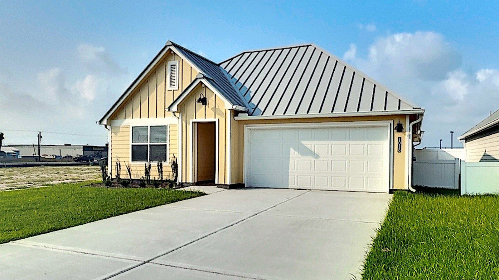 Front of home with sea glass exterior