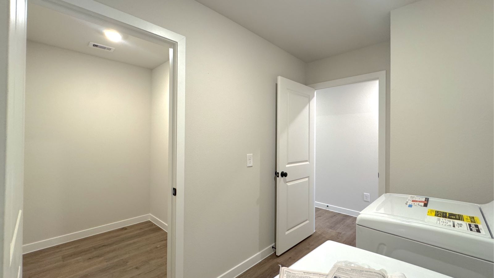 hidden storage and laundry room