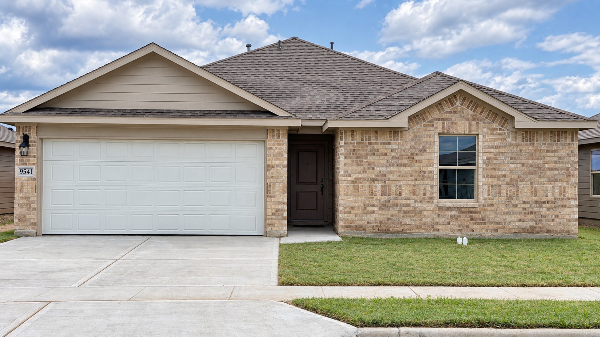 single family one story home with two car garage