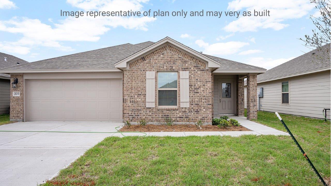Single family one story home with brick and two car garage