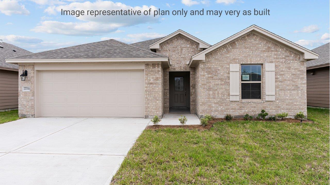 Single family one story home with brick and two car garage