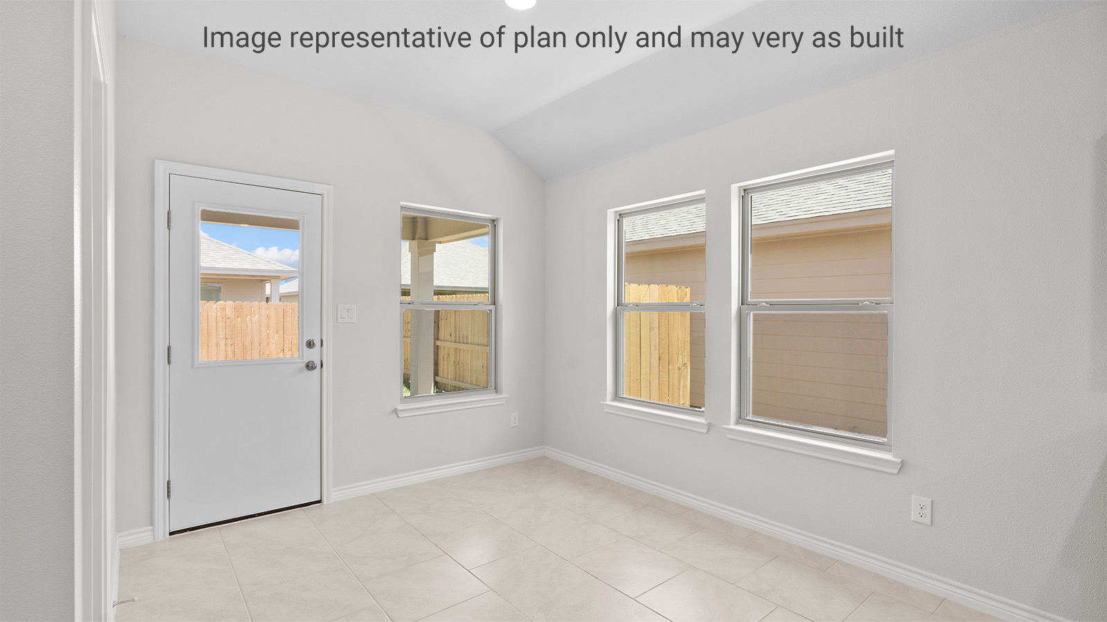 Baxtor Plan- Living room looking to dining and kitchen areas in this new home features natural light, with open concept design