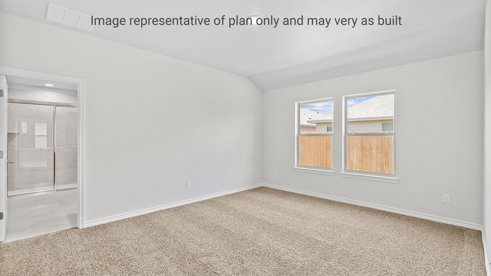 Primary bedroom designed with privacy and space in mind with a flow into a spa-inspired ensuite bathroom and walk-in closet