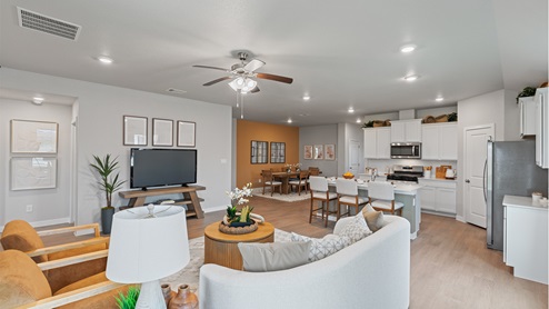 Open floor plan of the living, kitchen, and dining area.