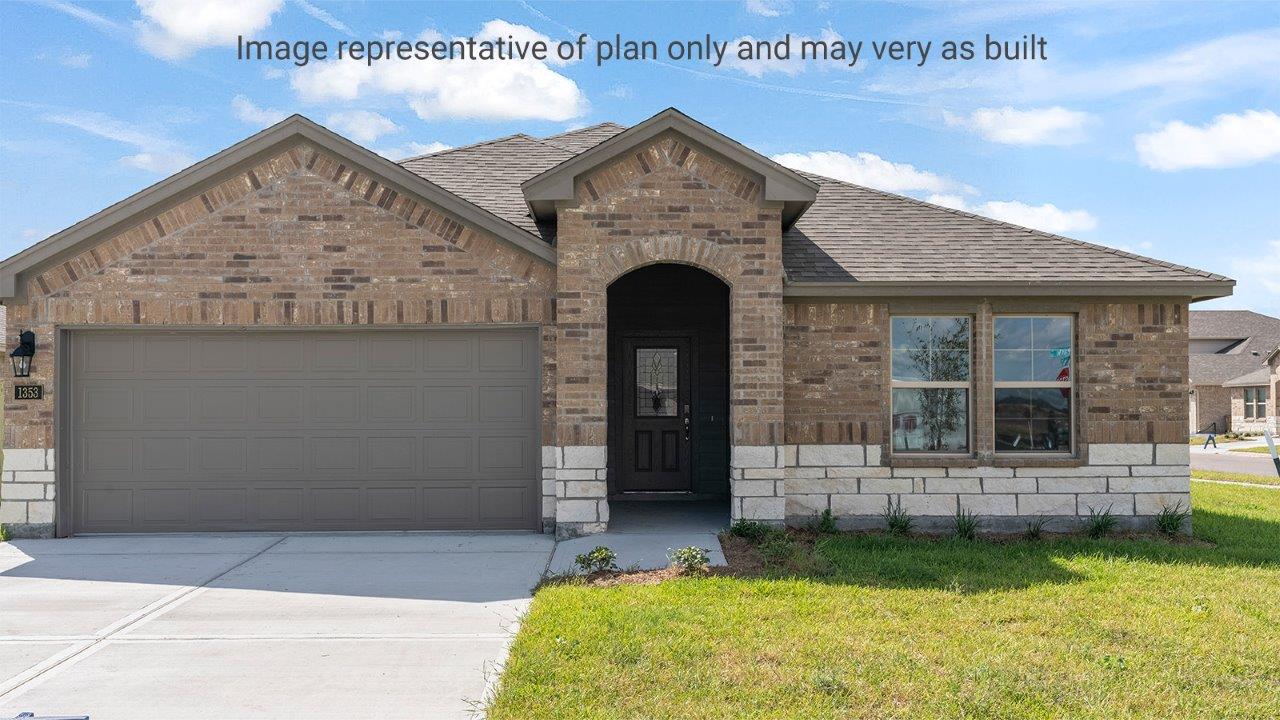 Single family one story home with brick and two car garage
