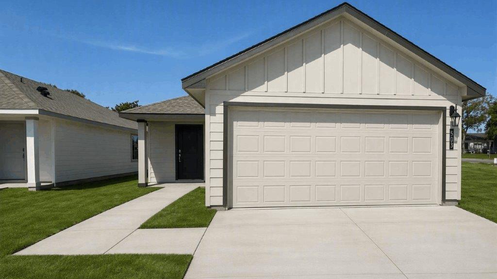 single family one story home with two car garage