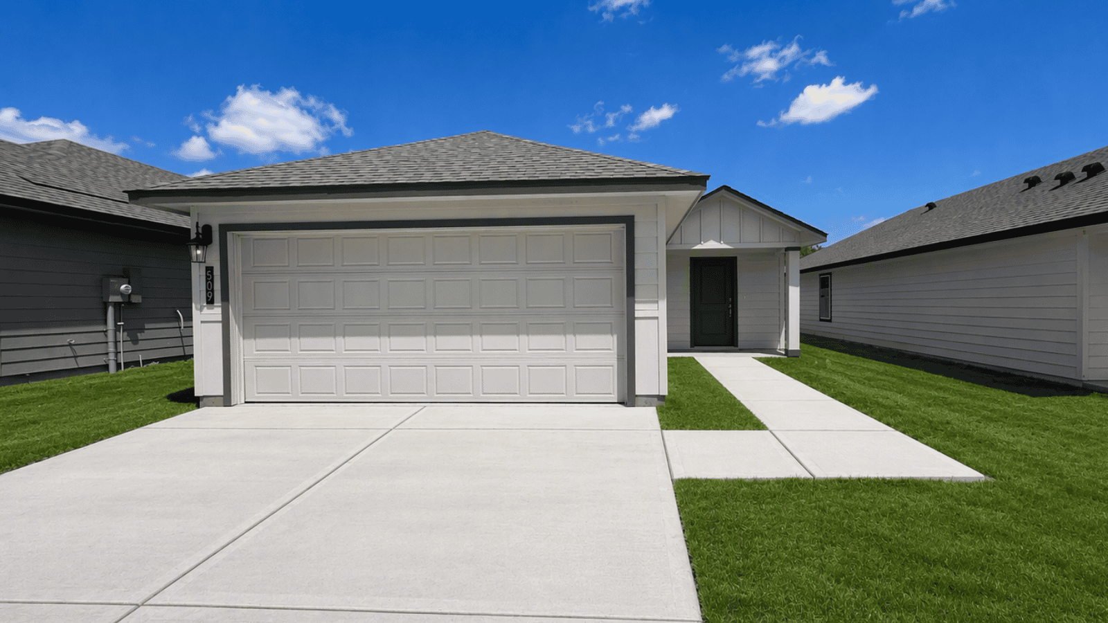 single family one story home with two car garage