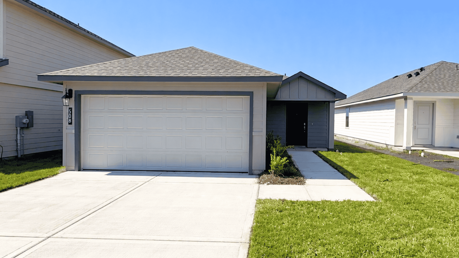 single family one story home with two car garage