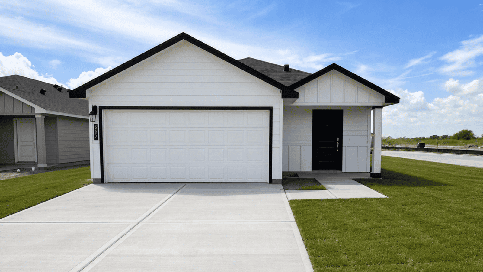 single family one story home with two car garage