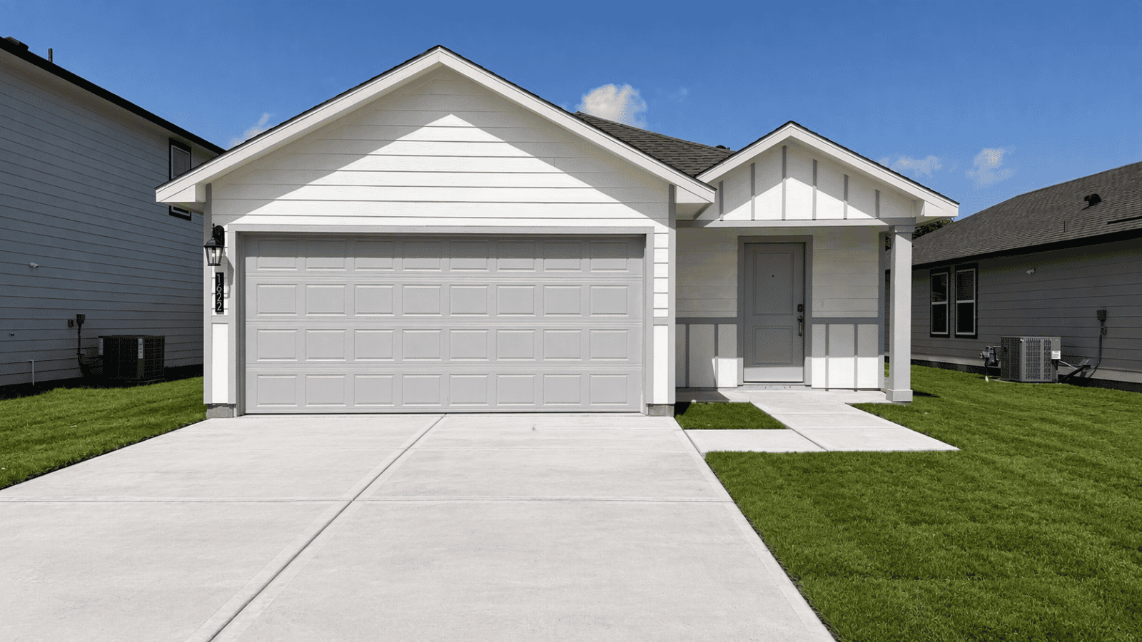 single family one story home with two car garage