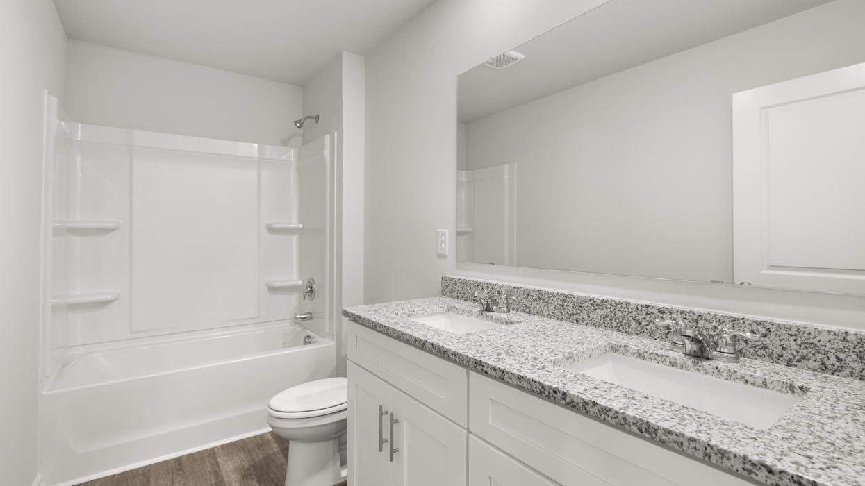 full bathroom and dual sinks