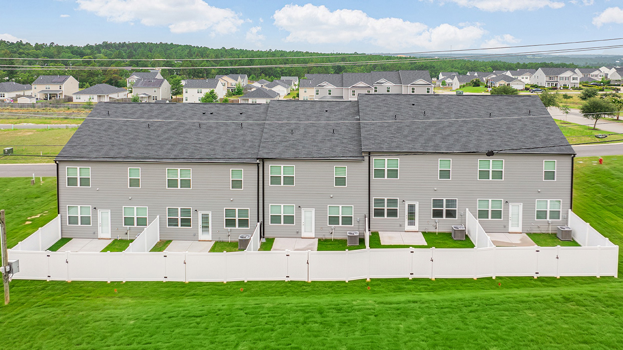 Rear of row of two story townhomes