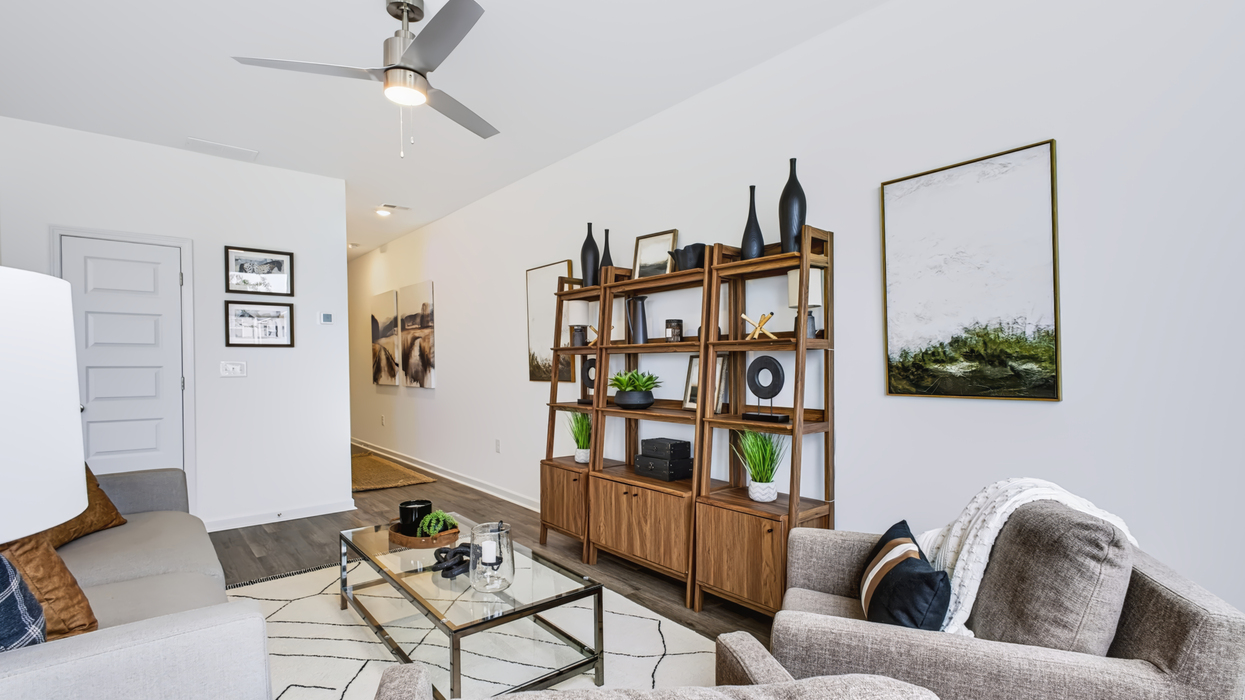 Living room with views of door to back patio.