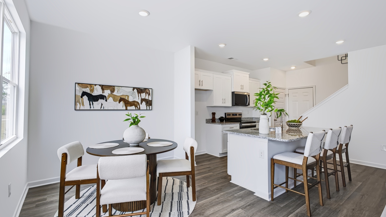 Dining area with door to back patio.