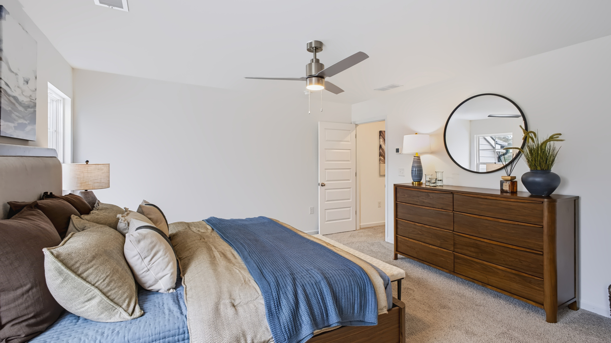 Large primary bedroom with oversized closet.