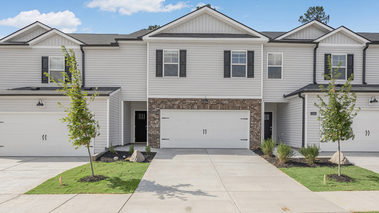 Two story townhome with a two-car garage