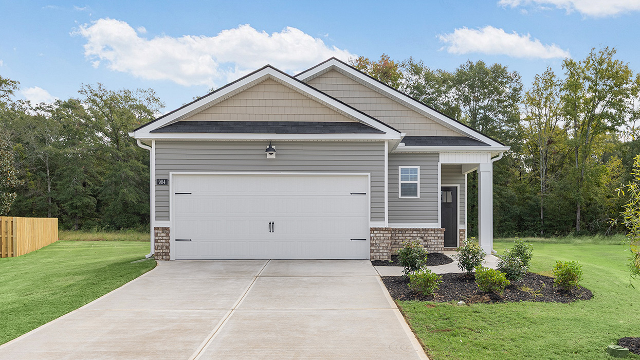 single story ranch home with two car garage