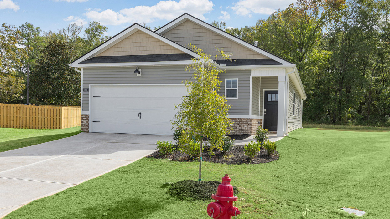 single story ranch home with two car garage