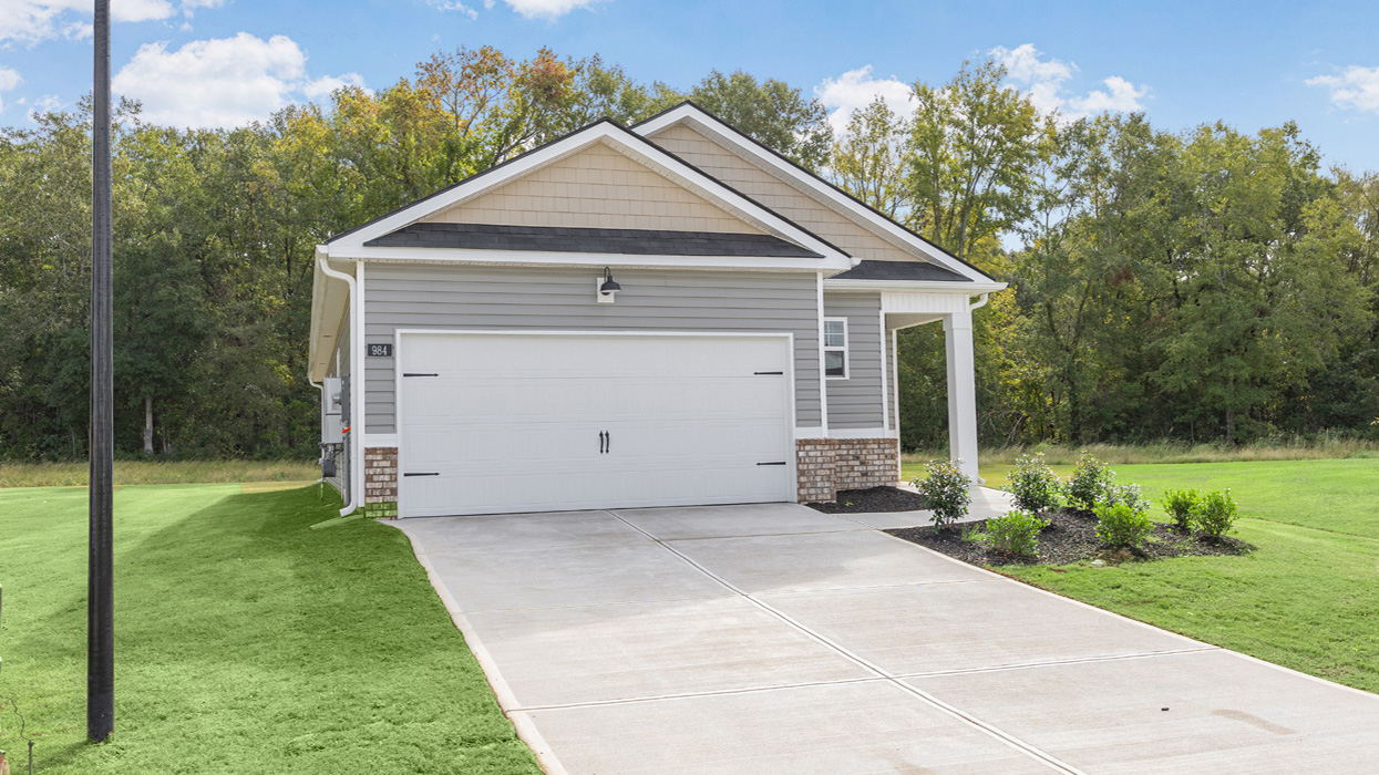 single story ranch home with two car garage