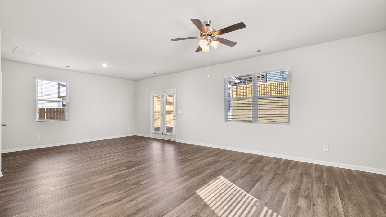Open living dining area off of kitchen.