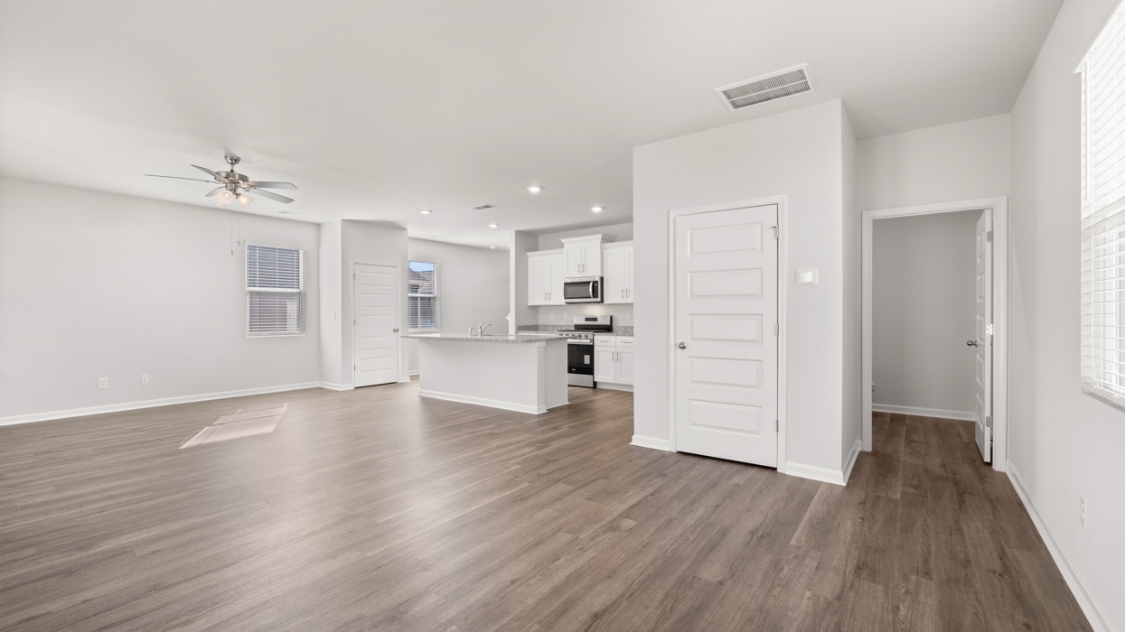 Open living dining area off of kitchen.