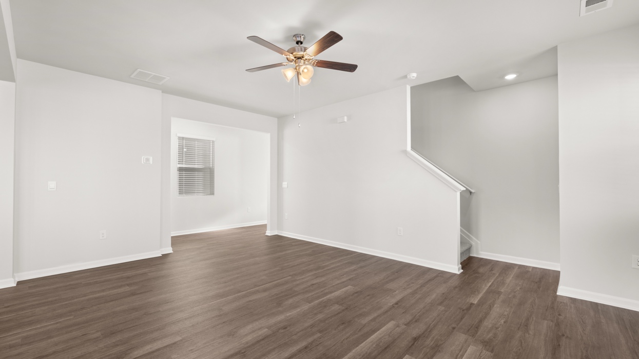 Open plan featuring large living and dining area opening to kitchen with large center island.
