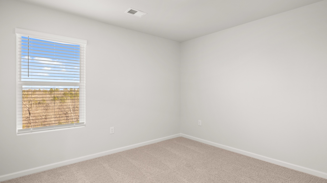 Guest bedroom with carpeting