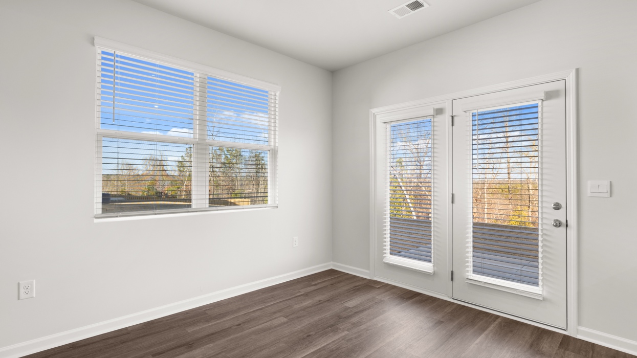 Dining area with door to back yard and back patio.