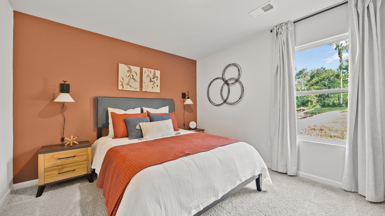 Guest bedroom upstairs with carpeting